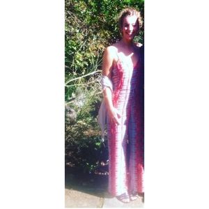 Red and teal tank pantsuit with wide leg and tie around the waist. Size large.